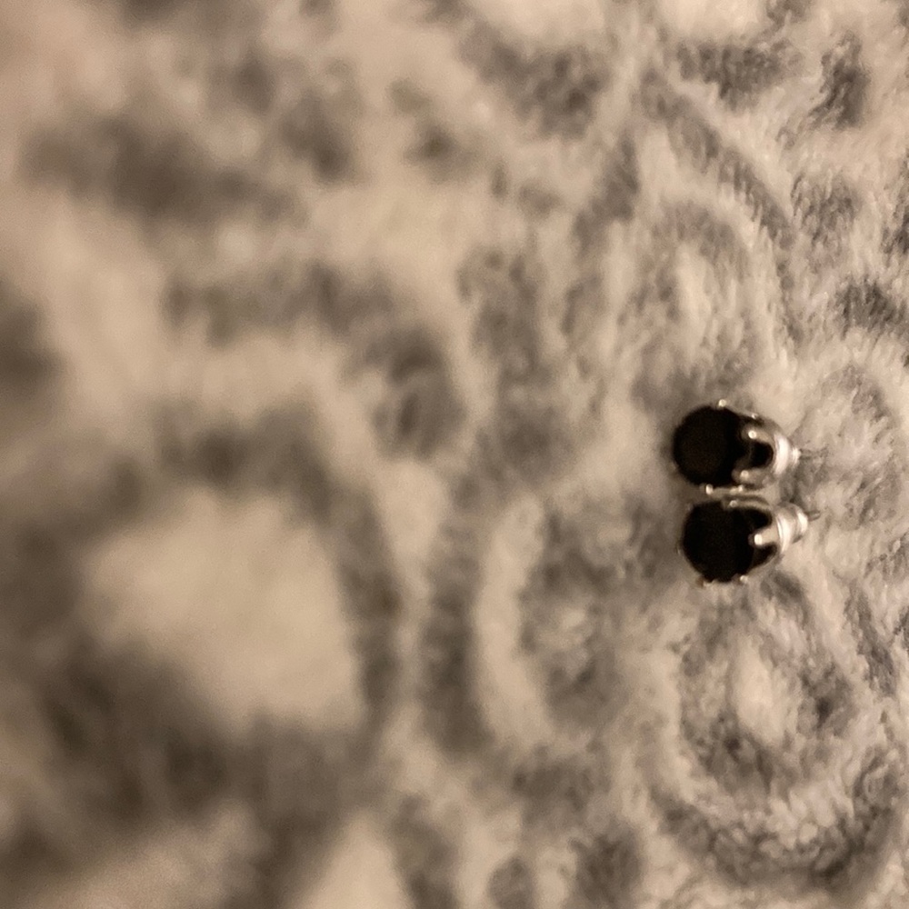 i’m selling earrings and they’re black